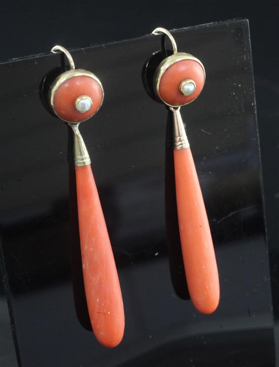 A pair of gold mounted, split pearl set coral drop earrings, overall 6cm.